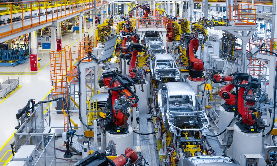 Robotic assembly line inside a vehicle manufacturing plant