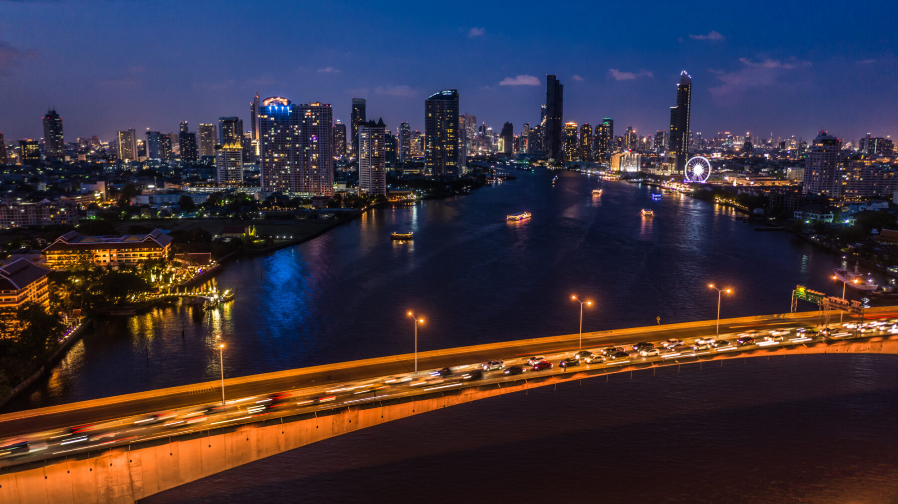 Bangkok skyline and the Chao Phraya River at dusk