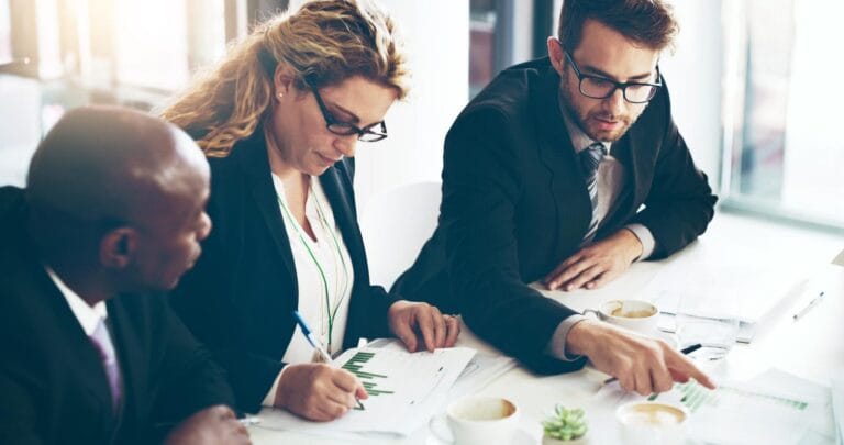 Finance team assessing corporate income tax exemption eligibility under Decree 20